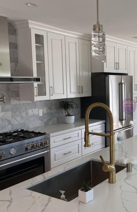Gold faucet and marble counter top